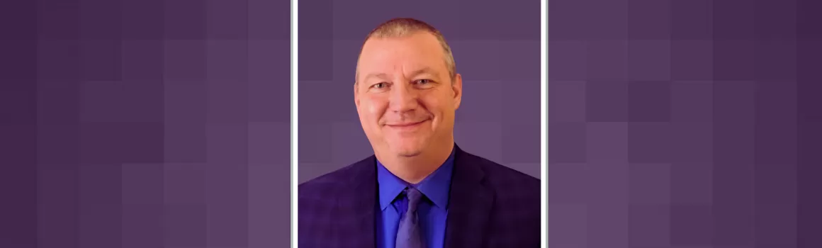 Chris Mulkey headshot on purple background